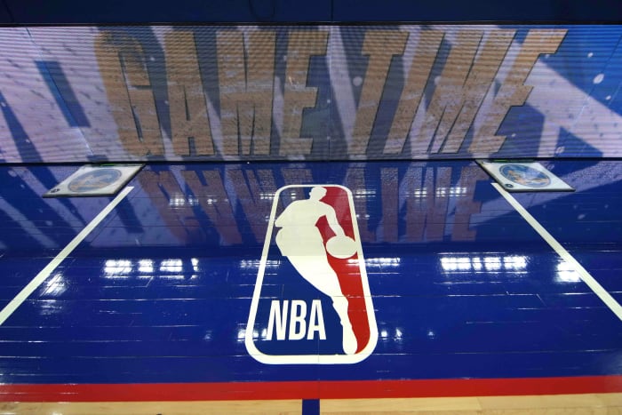 Mar 12, 2022; San Francisco, California, USA; A view of the NBA logo painted on the sideline before the game between the Golden State Warriors and the Milwaukee Bucks at Chase Center.